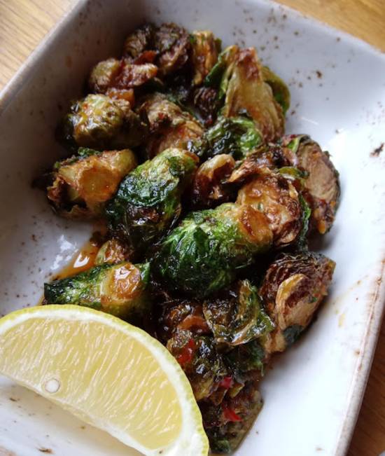 Cafe Tu Tu Tango signature dishes Crispy Brussels SproutsDynamite ShrimpButter Chicken Tikka Masala